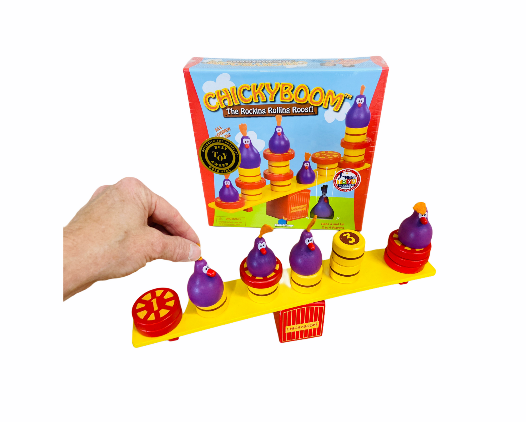 Blue Orange Chickyboom with purple chickens balancing on yellow roost with hand removing one chicken