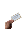 a hand holding a card from the Classroom Proprioceptive Activities Cards