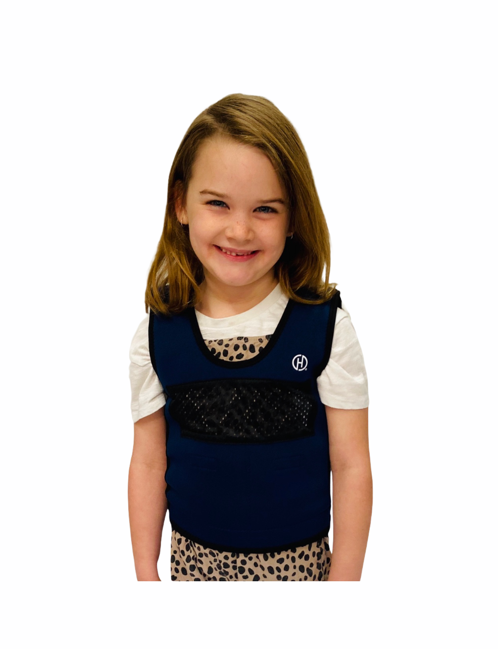 young girl smiling wearing the navy blue Harkla Weighted Compression Vest - Small with white background