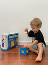 young boy playing with the Smart Games Bunny Boo Game