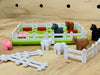 Smart Games Smart Farmer Logic game on display with pieces on table