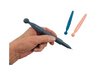 a hand holding a Kaiko Fidget Pen - Silicone Top with 2 in the background
