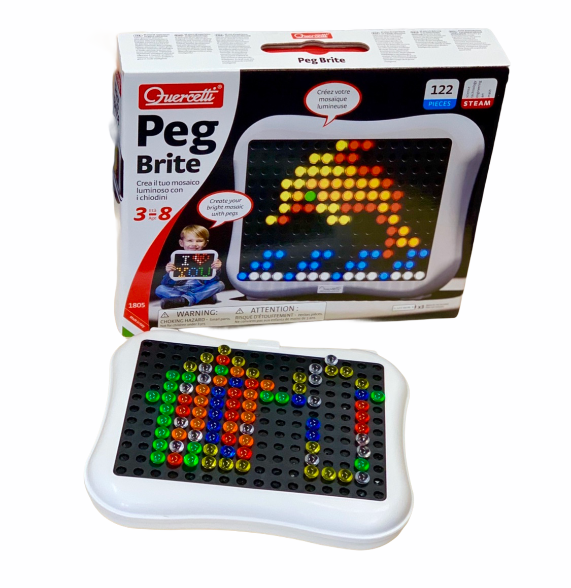 Quercetti Peg Brite on display in front of box