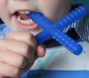 child chewing on the blue Chew Stixx Plain