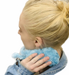 woman holding the Senseez Vibrating Handheld Massager Jellyfish on her neck